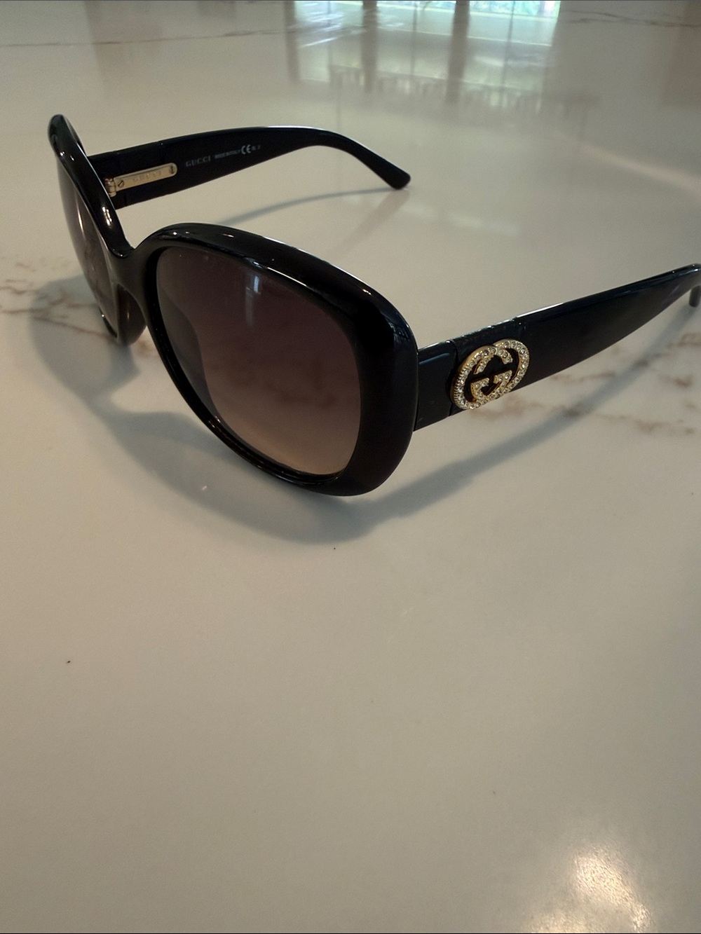 Gucci Black Sunglasses with Gold Logo Accent